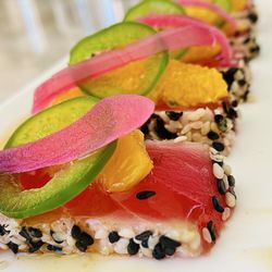 Veranda - "Sesame Crusted Ahi Tuna Tataki" Jalapeño Orange Pickled Red Onion w/Ponzu. Jalapeño-Orange combo makes it. Highest Reccomendations.