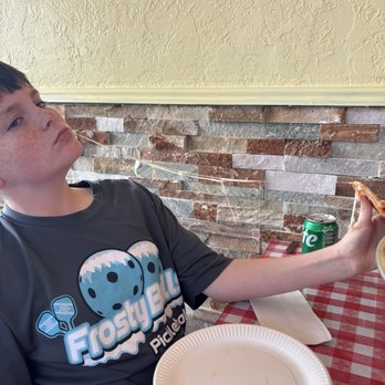 Mama Maxie's Pizzeria - Mozzarella stretch - Pizza Near Me - Henderson, Nevada Mama Maxie's Pizzeria - Mozzarella stretch - Pizza Near Me - Henderson, Nevada