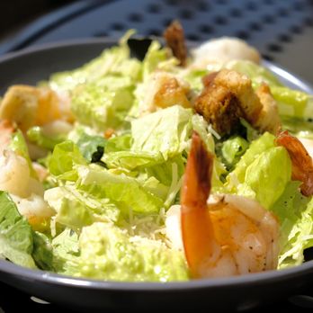 The Calcutta Grill - Caesar with shrimp - New American Near Me - Newcastle, Washington The Calcutta Grill - Caesar with shrimp - New American Near Me - Newcastle, Washington