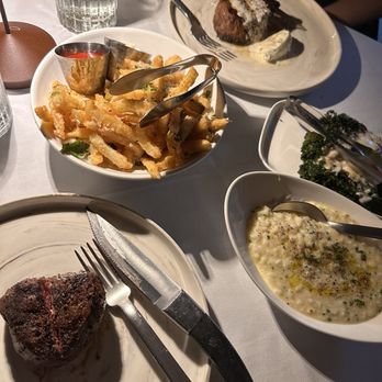Dakota’s Steakhouse - Filets, risotto, fries, and broccolini  Charred Broccolini  Parmesan Risotto  Truffle Parm Fries - Steakhouses Near Me - Dallas, Texas