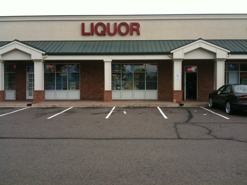 Thom's Gateway Liquors Logo