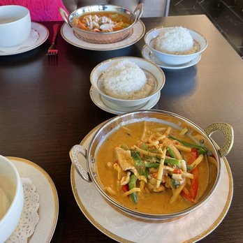 Thai Nine Restaurant - Green curry and rice. Tom kha soup. Panang curry in the background. - Thai Near Me - Carmel, Indiana