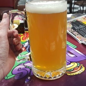 Dick's Cafe - a person holding a glass of beer - Mexican Near Me - Las Cruces, New Mexico Dick's Cafe - a person holding a glass of beer - Mexican Near Me - Las Cruces, New Mexico