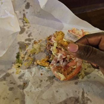 Daisy's Po' Boy and Tavern - Alligator strip pieces from po boy. Served barely warm, pieces very thin and small. 2 stars. - Cajun/Creole Near Me - Chicago, Illinois