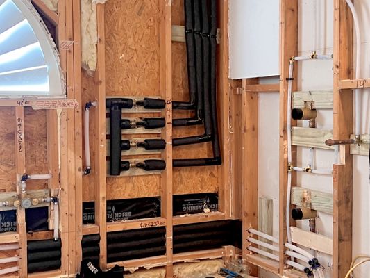 Rolling Wood Project - This bathroom remodel includes re-piping and re-routing water lines for a bathroom remodel. Rolling Wood Project - This bathroom remodel includes re-piping and re-routing water lines for a bathroom remodel.
