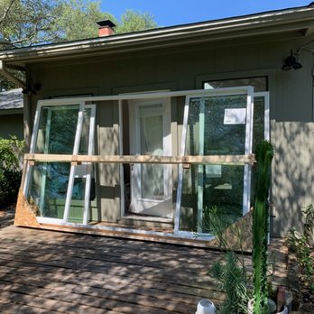 Ultra Services Remodeling - Full glass sliding doors replacing a door and two small windows in our sunroom - Painters Near Me - Austin, Texas Ultra Services Remodeling - Full glass sliding doors replacing a door and two small windows in our sunroom - Painters Near Me - Austin, Texas
