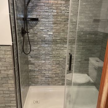 Fearless Home Services - New tub surround and complete with glass shower door - General Contractors Near Me - Hayes, Virginia Fearless Home Services - New tub surround and complete with glass shower door - General Contractors Near Me - Hayes, Virginia