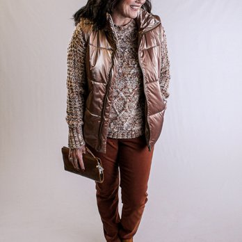 Fashion Crossroads - Metallic vest paired over a cable knit sweater and paired with colored denim and shoe boots. - Women's Clothing Near Me - Casper, Wyoming Fashion Crossroads - Metallic vest paired over a cable knit sweater and paired with colored denim and shoe boots. - Women's Clothing Near Me - Casper, Wyoming