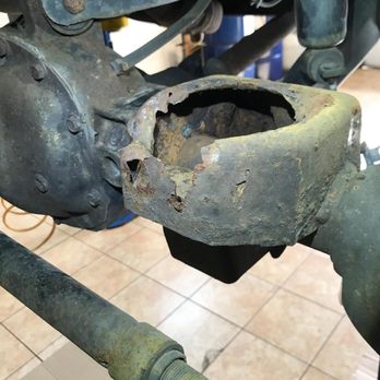 Daves Auto Service - Repairing rust on a Jeep front coil spring pocket - Auto Repair Near Me - Boyertown, Pennsylvania