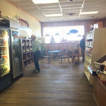 Piedmont Deli - Interior, with seating area by the window - Delis Near Me - Madison, Virginia Piedmont Deli - Interior, with seating area by the window - Delis Near Me - Madison, Virginia