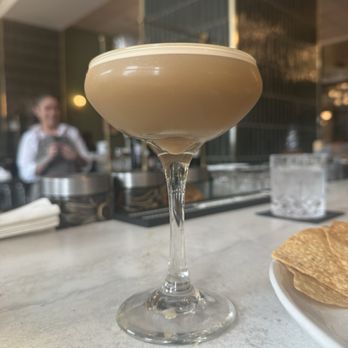 Presley's Kitchen & Bar - This is the hand shaken espresso martini with a splash of Baileys - by Christina - American Near Me - Detroit, Michigan Presley's Kitchen & Bar - This is the hand shaken espresso martini with a splash of Baileys - by Christina - American Near Me - Detroit, Michigan