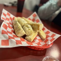 Cadena Bro’s Pizzeria - This cheese bread is great. Would make and amazing grinder, which they have!!