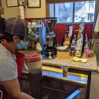 Hawaii Gelato - Barista preparing a Kona iced coffee with Kona coffee ice cubes. Small size, $3.25. - Gelato Near Me - Lahaina, Hawaii