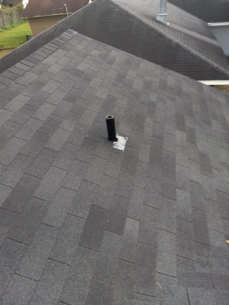 Slide of Tres Coronas Roofing