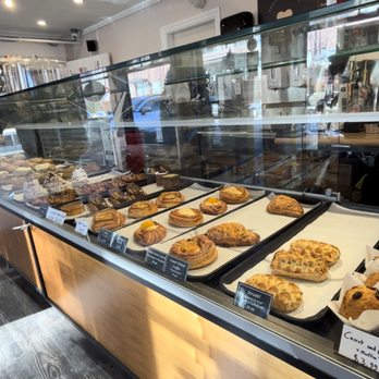 Bisou Bake House - The display case on a Sunday, right before the morning rush arrives and clears it out. - Bakeries Near Me - North Vancouver, British Columbia Bisou Bake House - The display case on a Sunday, right before the morning rush arrives and clears it out. - Bakeries Near Me - North Vancouver, British Columbia