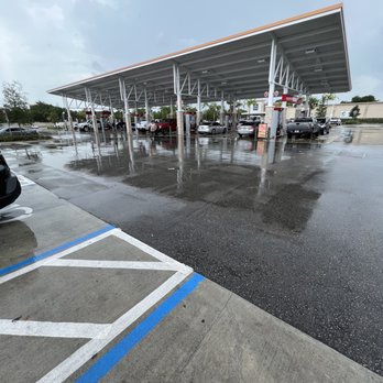 Wawa - a parking lot with a gas station in the background - Gas Stations Near Me - Ft Lauderdale, Florida Wawa - a parking lot with a gas station in the background - Gas Stations Near Me - Ft Lauderdale, Florida