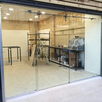 Legend Glass - Shopfront sliding door glass - Glass & Mirrors Near Me - London, XGL Legend Glass - Shopfront sliding door glass - Glass & Mirrors Near Me - London, XGL