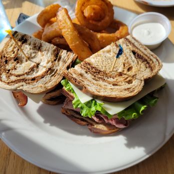 Maple on the Lake - Roast beed club on marble rye with side of rings. - American Near Me - East Berne, New York