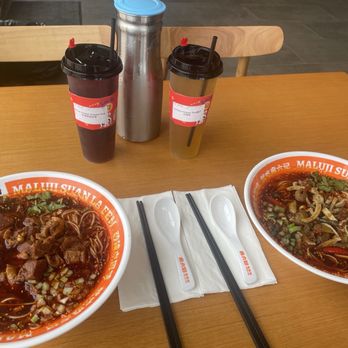 Maluji Suanlafen - Left: Noodles with Braised beef | Rose grape green tea Right: Noodles with Pickled chillies and Crispy trio | Lemon green tea - Chinese Near Me - Rowland Heights, California