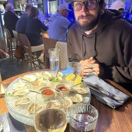Half-priced pinot Grigio & individually priced oysters made for a perfect meal!