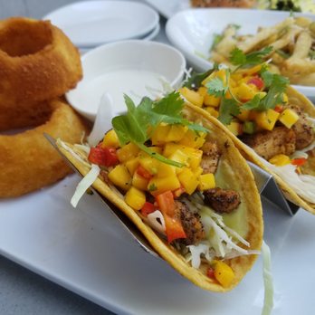 Eureka! - Mahi Mahi tacos with a side of onion rings - American Near Me - Concord, California Eureka! - Mahi Mahi tacos with a side of onion rings - American Near Me - Concord, California