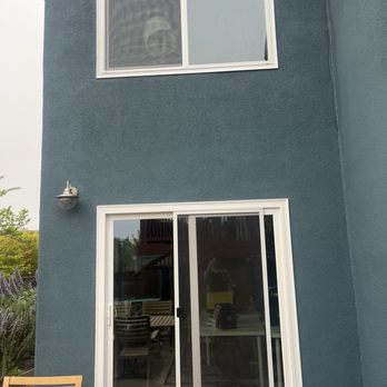 Geovanni Handyman - New window and sliding door installation, replaced old wood siding with stucco and added new insulation - Handyman Near Me