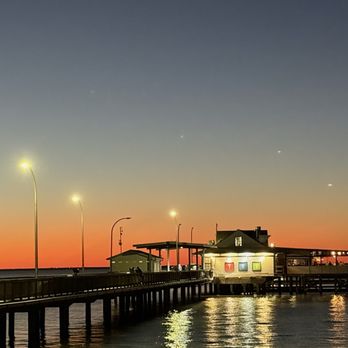The Blind Tiger - Outside pier view at sunset. - Seafood Near Me - Fairhope, Alabama The Blind Tiger - Outside pier view at sunset. - Seafood Near Me - Fairhope, Alabama