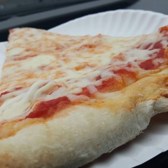 Perfetto's Pizza - a slice of pizza on a paper plate - Pizza Near Me - Trenton, New Jersey Perfetto's Pizza - a slice of pizza on a paper plate - Pizza Near Me - Trenton, New Jersey