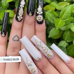TD Nail Salon - Elevate your style with black and white nails, accented with dazzling diamonds. A perfect blend of elegance and glamour!