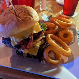 a burger and onion rings a burger and onion rings