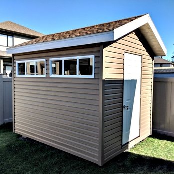 Summit - Sheds and Structures - a storage shed in a backyard - General Contractors Near Me Summit - Sheds and Structures - a storage shed in a backyard - General Contractors Near Me