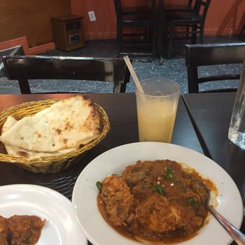 Sana - two plates of food and a glass of orange juice - Pakistani Near Me - Montreal, Quebec Sana - two plates of food and a glass of orange juice - Pakistani Near Me - Montreal, Quebec