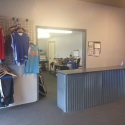 Kay's Screen Printing & Embroidery - Front desk where you can talk to the receptionist and some of the graphic designers