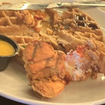Noir Kitchen & Cocktails - Traditional waffle with fried lobster tail - Soul Food Near Me - Nashville, Tennessee Noir Kitchen & Cocktails - Traditional waffle with fried lobster tail - Soul Food Near Me - Nashville, Tennessee