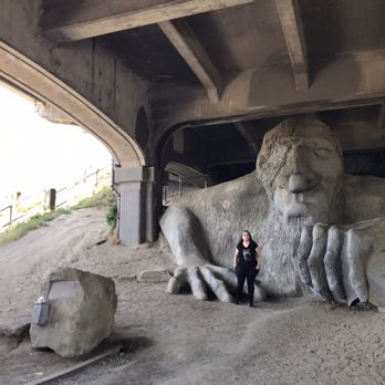Fremont Troll - Farther away picture of daughter with the troll - Public Art Near Me - Seattle, Washington