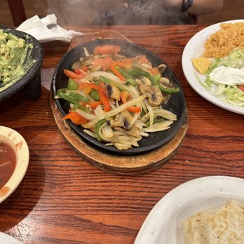 Panchito’s Mexican Grill - a woman sitting at a table - Mexican Near Me - Fort Mill, South Carolina