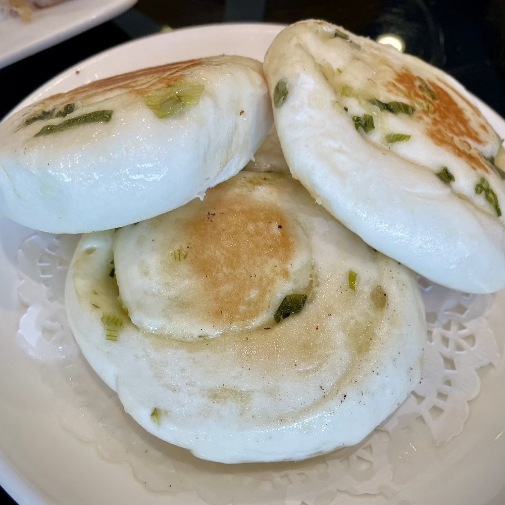 Phoenix Restaurant - Scallion pancakes: very fluffy and more bread-y compared to traditional oily and fried scallion pancakes - Dim Sum Near Me - Chicago, Illinois Phoenix Restaurant - Scallion pancakes: very fluffy and more bread-y compared to traditional oily and fried scallion pancakes - Dim Sum Near Me - Chicago, Illinois