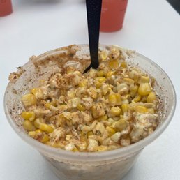a bowl of oatmeal with a spoon sticking out of it a bowl of oatmeal with a spoon sticking out of it