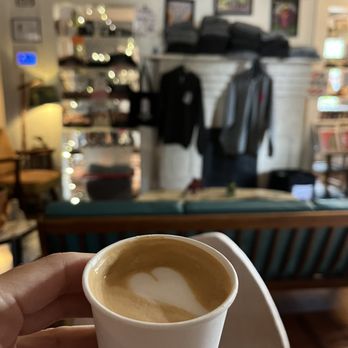 Battle Cat - a person holding a cup of coffee - Coffee & Tea Near Me - Asheville, North Carolina Battle Cat - a person holding a cup of coffee - Coffee & Tea Near Me - Asheville, North Carolina