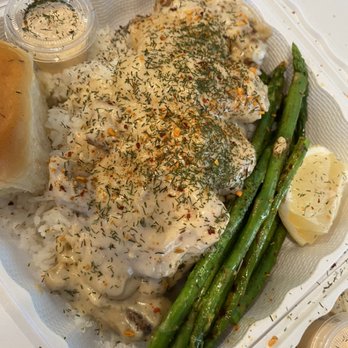 Papa Jerm The Chef Catering - Smothered chicken over rice with asparagus - Caterers Near Me Papa Jerm The Chef Catering - Smothered chicken over rice with asparagus - Caterers Near Me