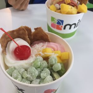 Photo of Mixx Frozen Yogurt - Allston, MA, United States. Froyos: Banana Strawberry, Lychee, Mango sherbet Toppings: Mango, coconut shavings, green tea mochi, waffle and a maraschino cherry