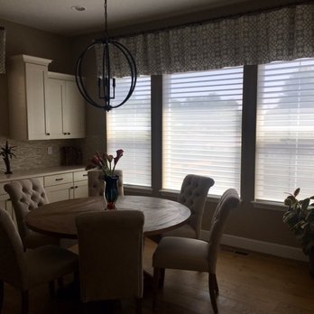 Roberts Floor Coverings - a kitchen with a table and chairs - Flooring Near Me - Denver, Colorado Roberts Floor Coverings - a kitchen with a table and chairs - Flooring Near Me - Denver, Colorado