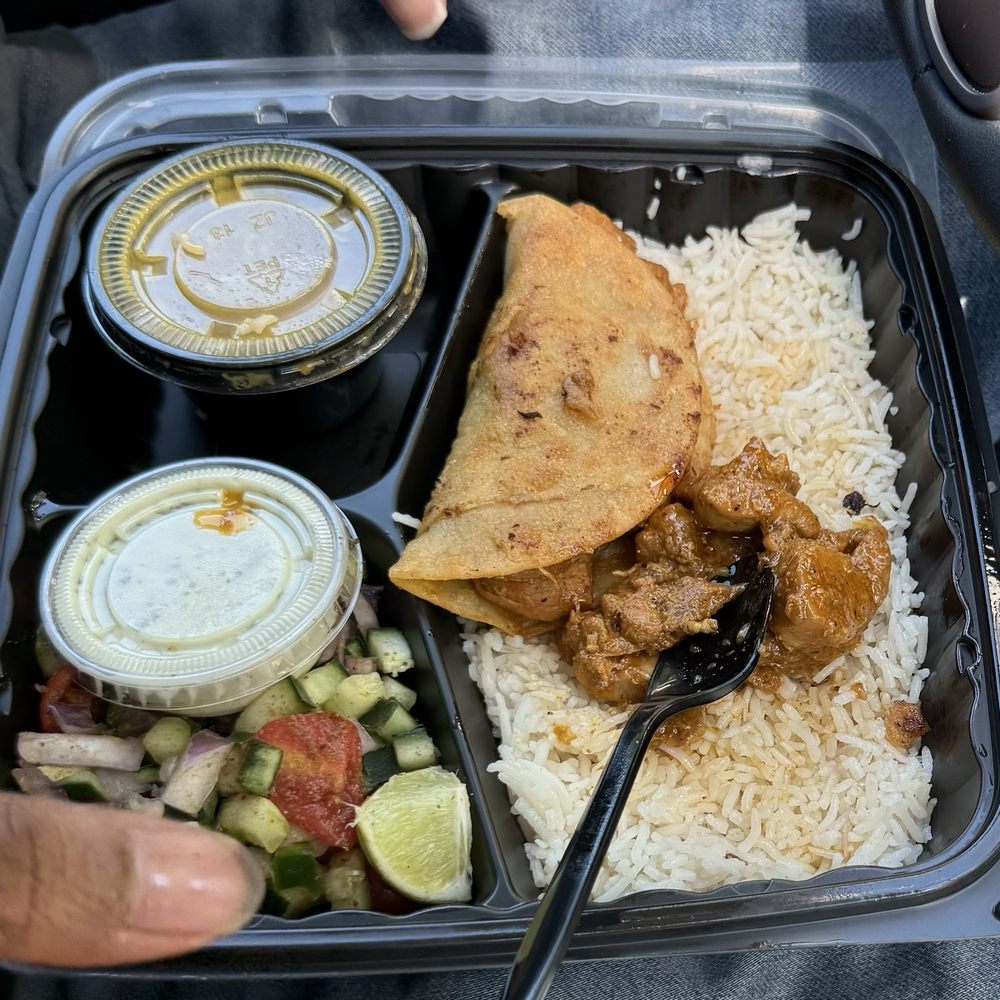 Chicken Karahi Rice Plate with a side of Chicken Karahi Taco Chicken Karahi Rice Plate with a side of Chicken Karahi Taco