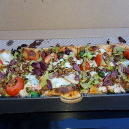 Create your own pizza with vegan sausage, broccoli, olives and tomatoes Create your own pizza with vegan sausage, broccoli, olives and tomatoes