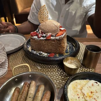 Toca Madera - French toast, sausage and eggs - Steakhouses Near Me - Houston, Texas Toca Madera - French toast, sausage and eggs - Steakhouses Near Me - Houston, Texas