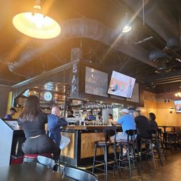 people sitting at the bar