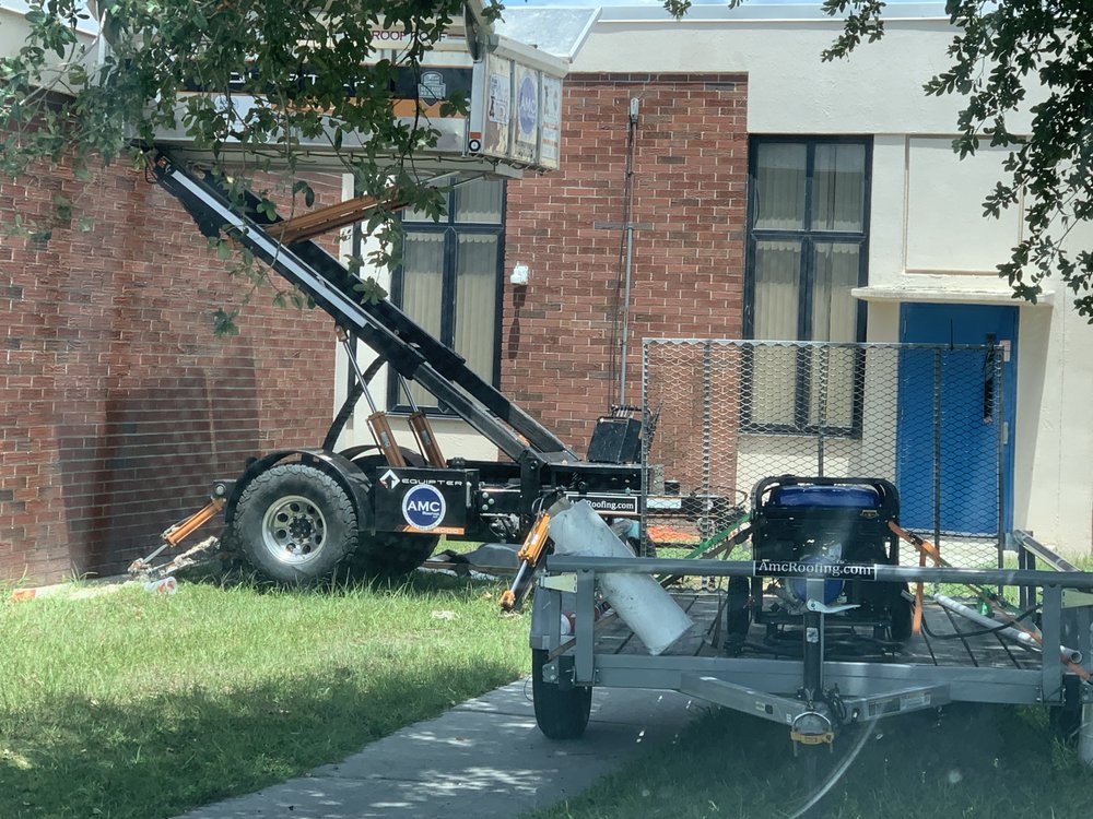 Slide of AMC Roofing