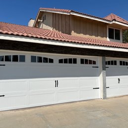 New garage door installation. Double insulated metal doors with LiftMaster 8500W side mount opener w/deadbolt.