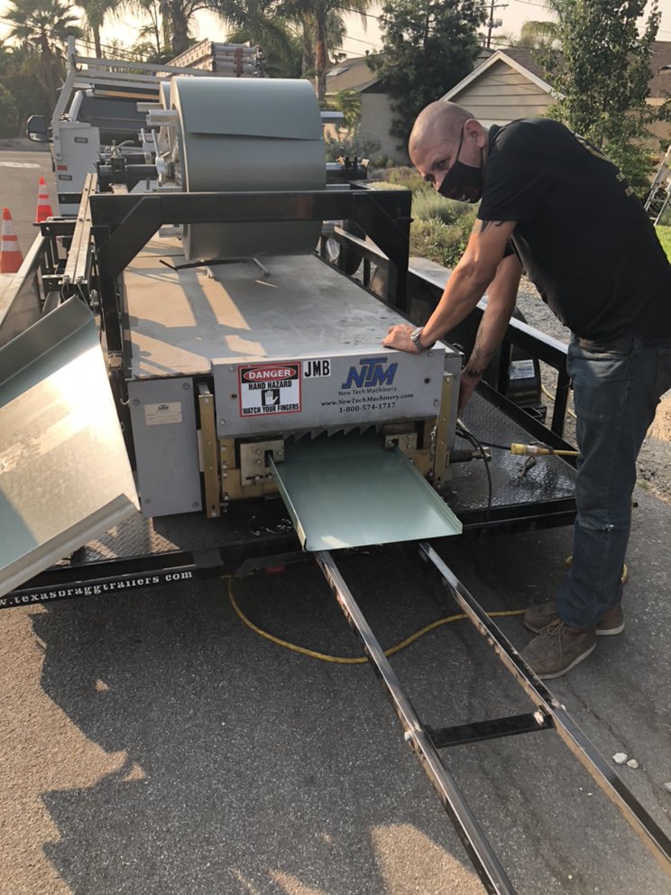 Slide of Reno's Roofing