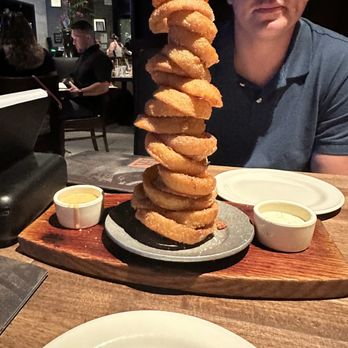 Yard House - Onion Ring Tower - New American Near Me - Honolulu, Hawaii